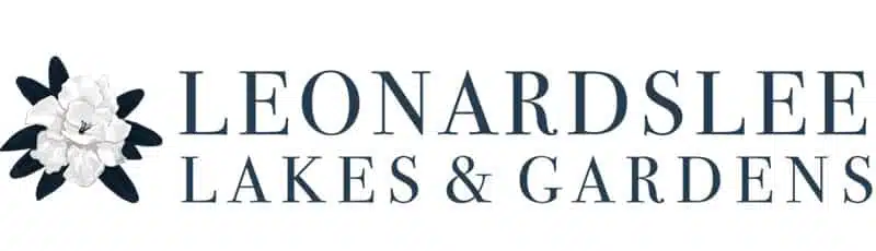 Leonardslee Lakes & Gardens logo with a white flower on the left.